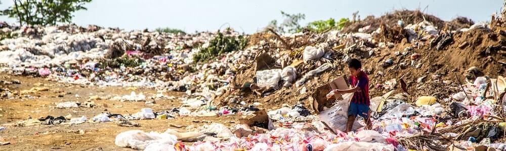 boy in garbage dump